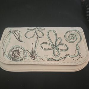 Artistic Cream Clutch with Floral Design